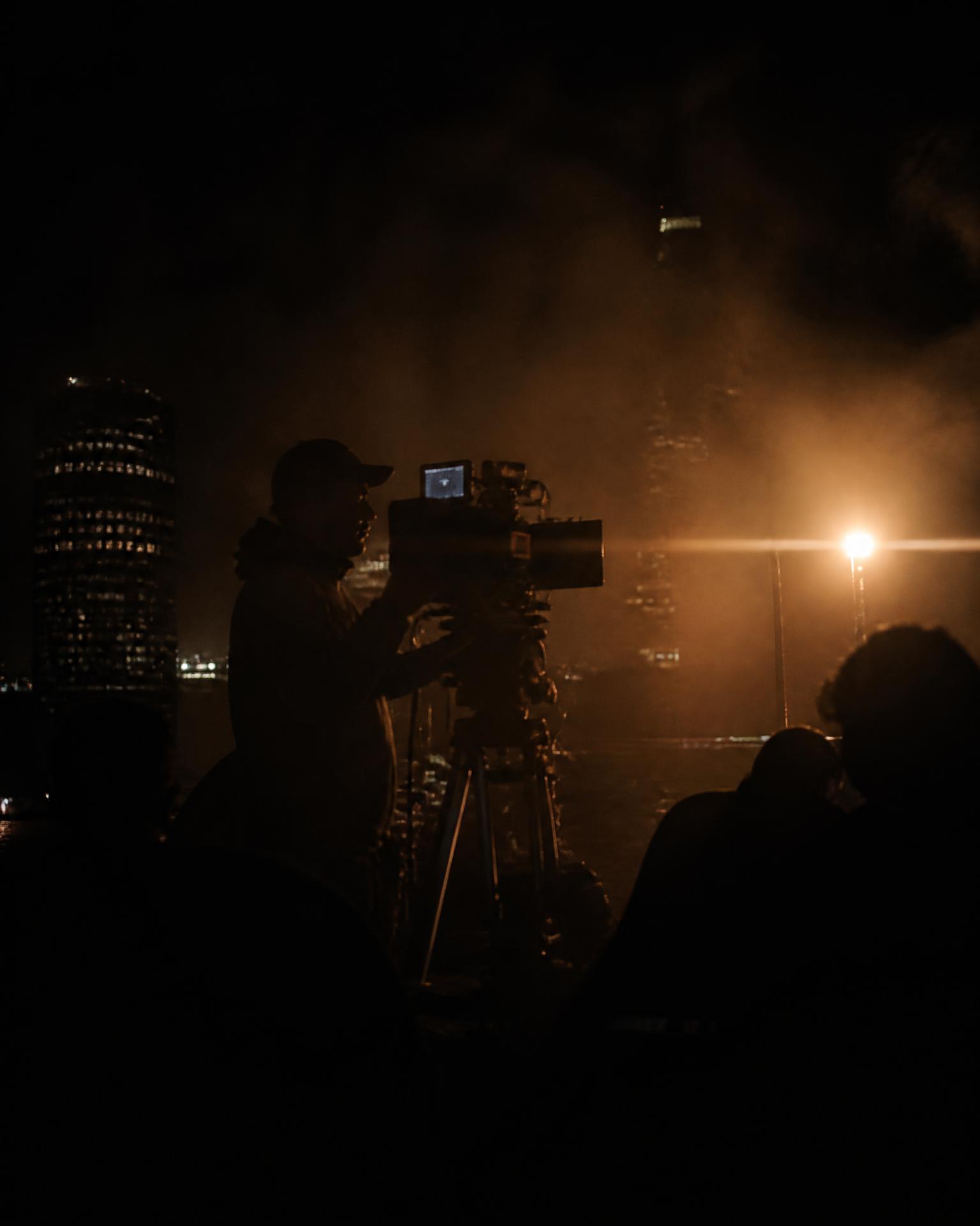 Film crew shooting at night